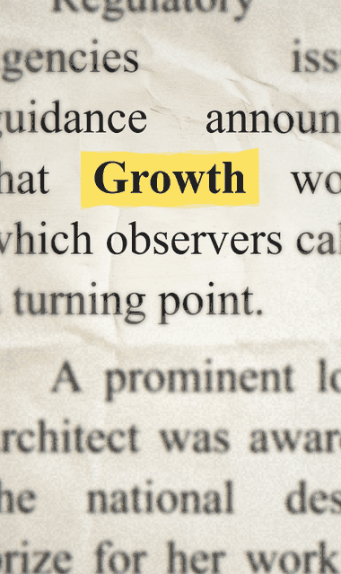 La palabra Growth resaltada sobre una hoja de papel
